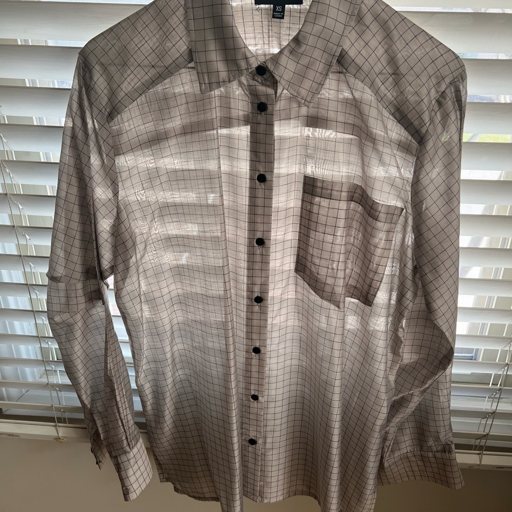 Woman’s Pale Gray Blouse